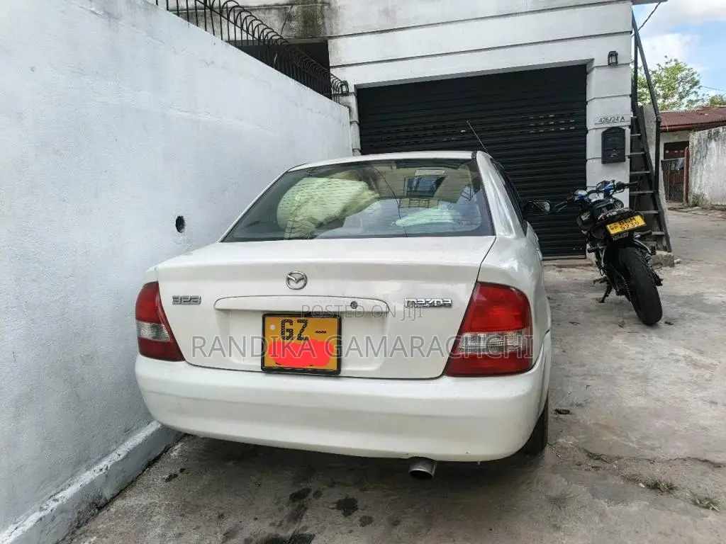 Mazda 323 1999 Car (Used)