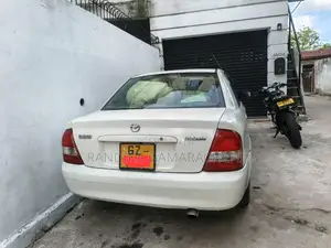 Mazda 323 1999 Car (Used)