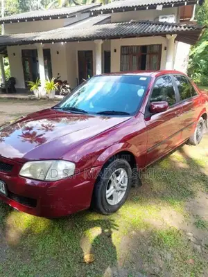Mazda 323 Model 2000 Car (Used)
