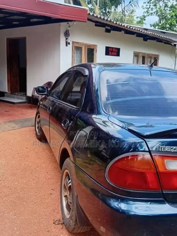 Mazda 323 1997 Car (Used)