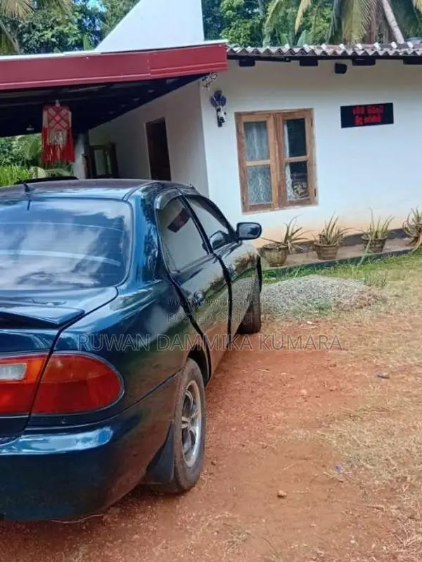 Mazda 323 1997 Car (Used)
