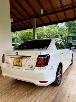 Toyota Axio Ivory 2018 Car (Used)