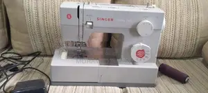 SINGER HEAVY DUTY SEWING MACHINE