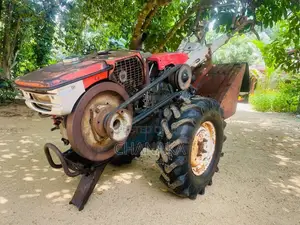 Kubota K75 1990 Tractor (Used)