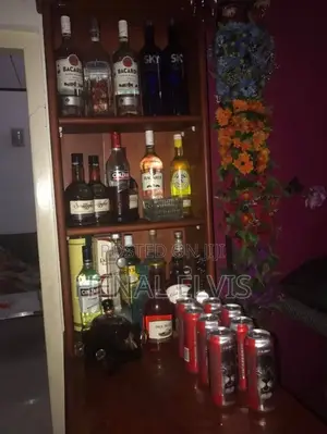 Teak Wooden Home Bar Counter With Overhead Glass Rack Shelves