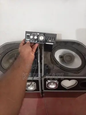 Three wheel speaker box with amp