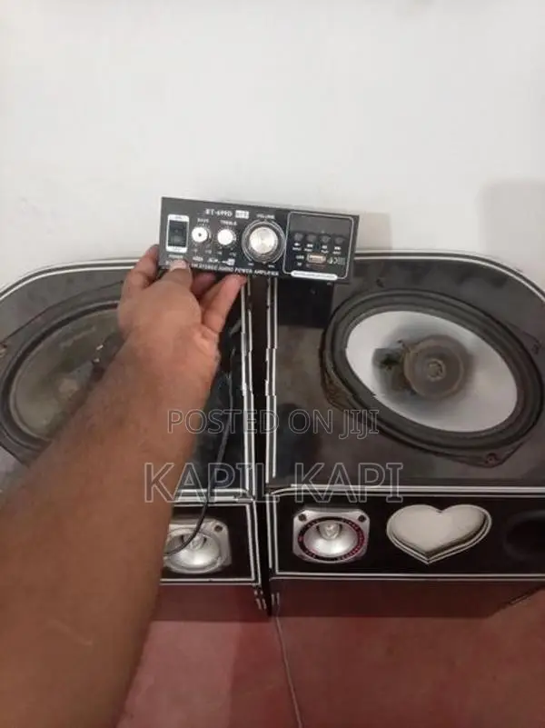Three wheel speaker box with amp