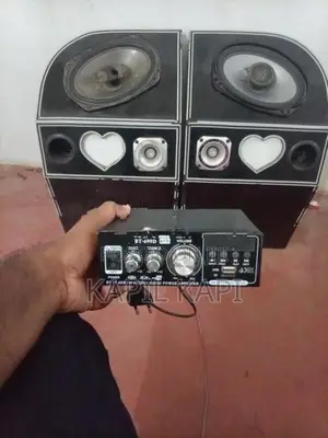 Three wheel speaker box with amp