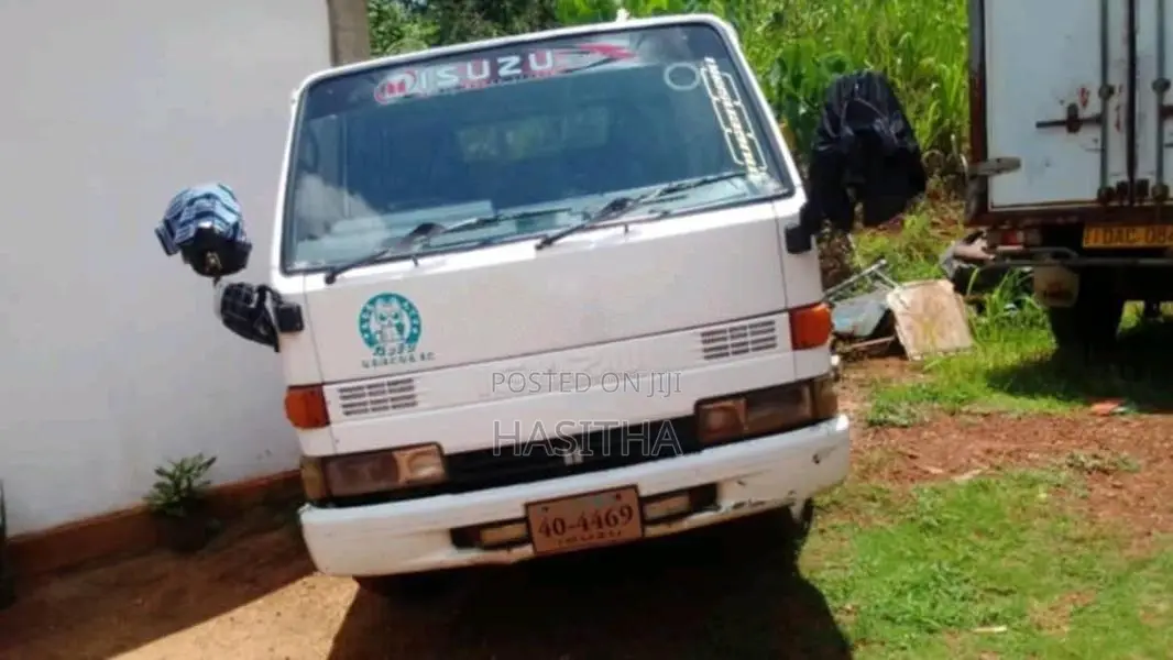 Isuzu ELF 1984 Crew Cab (Used)