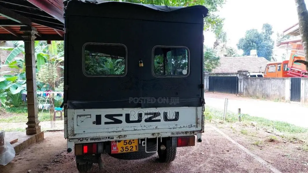 Isuzu ELF 1995 Crew Cab (Used)
