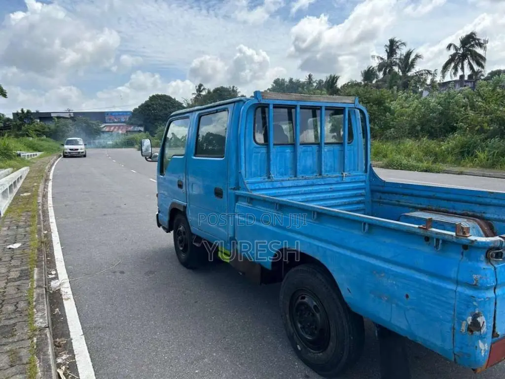 Isuzu ELF 2000 Crew Cab (Used)