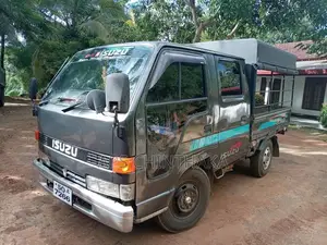 Isuzu ELF 1983 Crew Cab (Used)