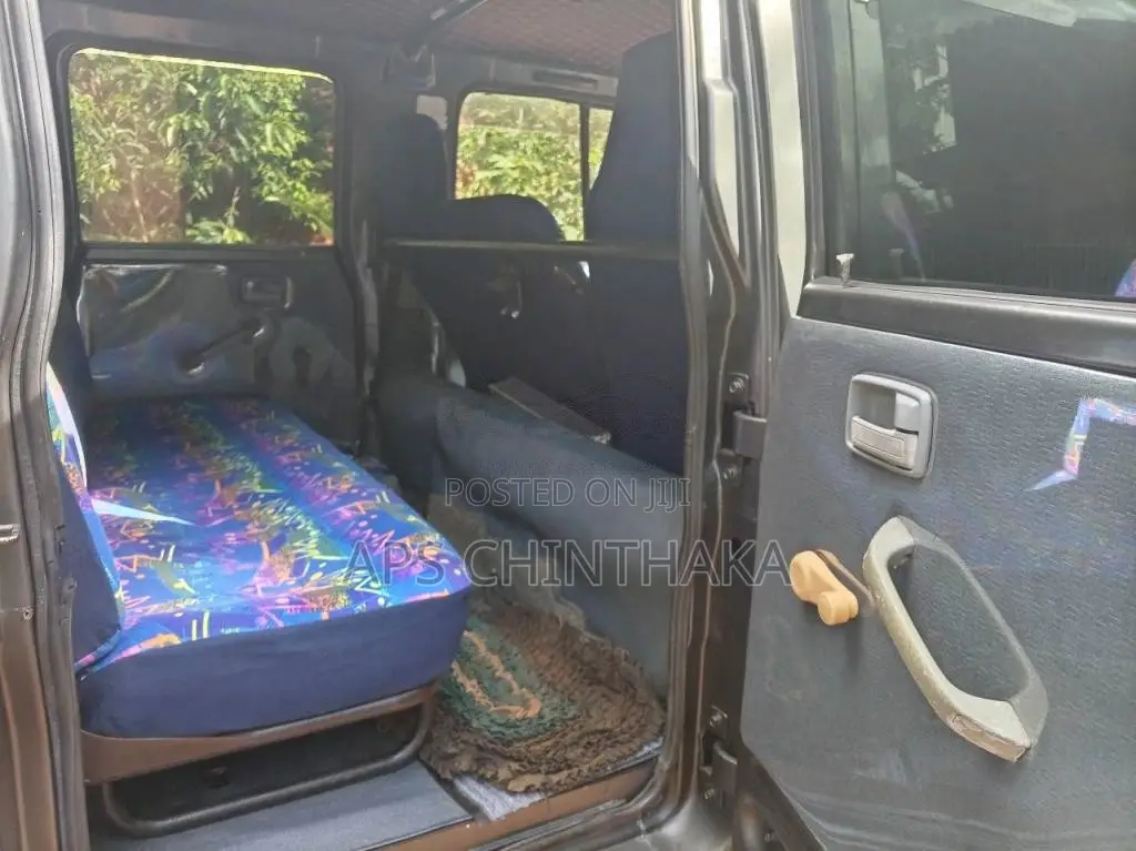 Isuzu ELF 1983 Crew Cab (Used)