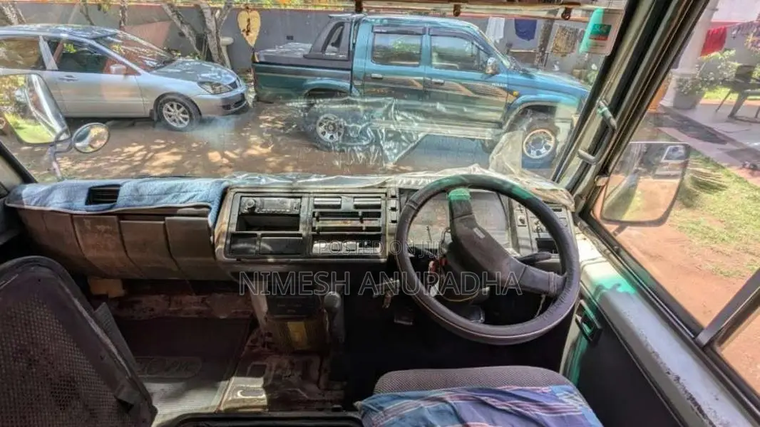 Mitsubishi Baby Rosa 1991 Bus (Used)
