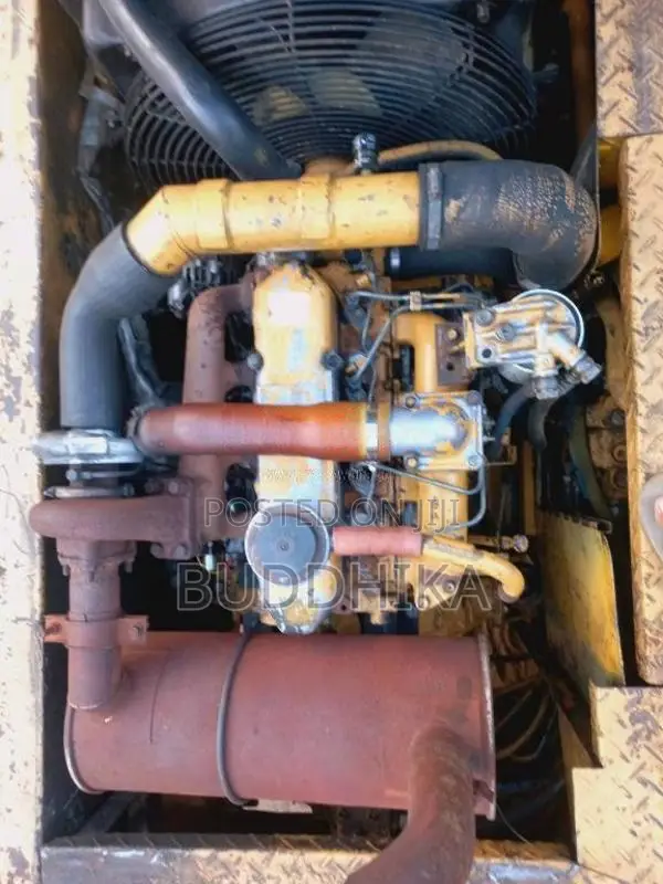 CAT E120B Caterpillar 1999 Heavy-Duty (Used)