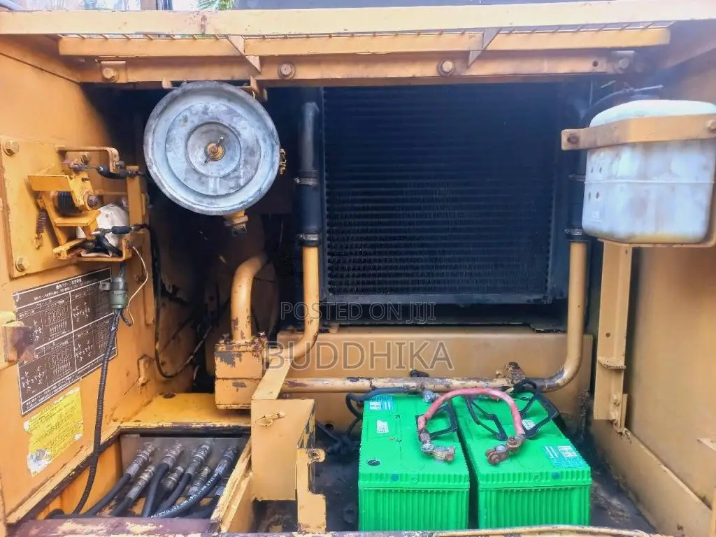CAT E120B Caterpillar 1999 Heavy-Duty (Used)