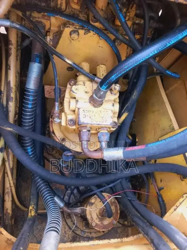 CAT E120B Caterpillar 1999 Heavy-Duty (Used)